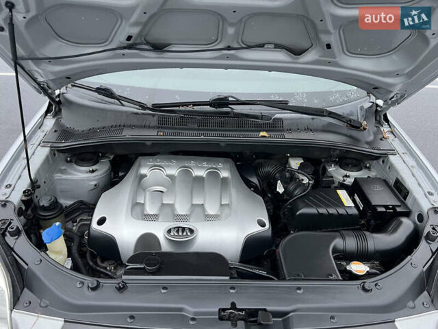 Серый Киа Sportage, объемом двигателя 2 л и пробегом 218 тыс. км за 8500 $, фото 35 на Automoto.ua