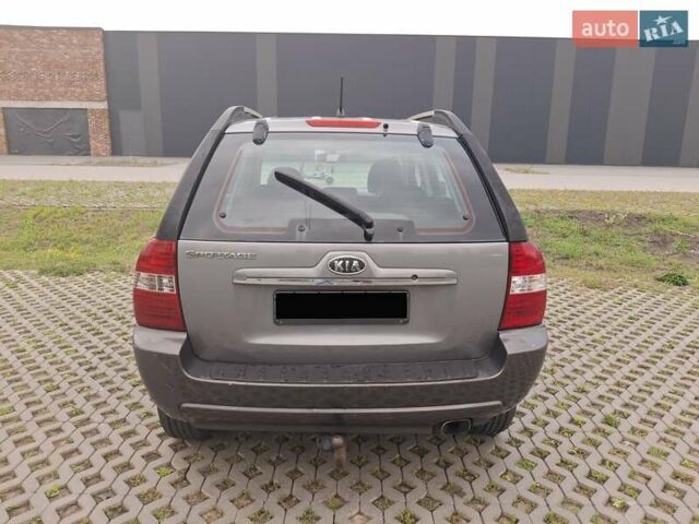 Серый Киа Sportage, объемом двигателя 2 л и пробегом 295 тыс. км за 8500 $, фото 56 на Automoto.ua