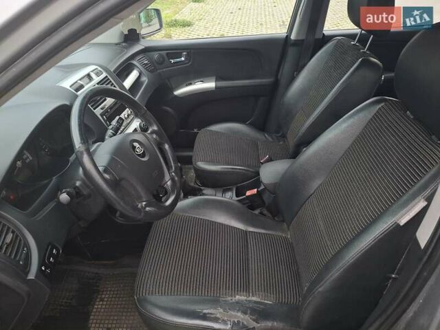 Серый Киа Sportage, объемом двигателя 2 л и пробегом 295 тыс. км за 8500 $, фото 9 на Automoto.ua