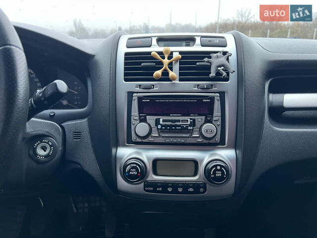 Серый Киа Sportage, объемом двигателя 2 л и пробегом 218 тыс. км за 8500 $, фото 31 на Automoto.ua