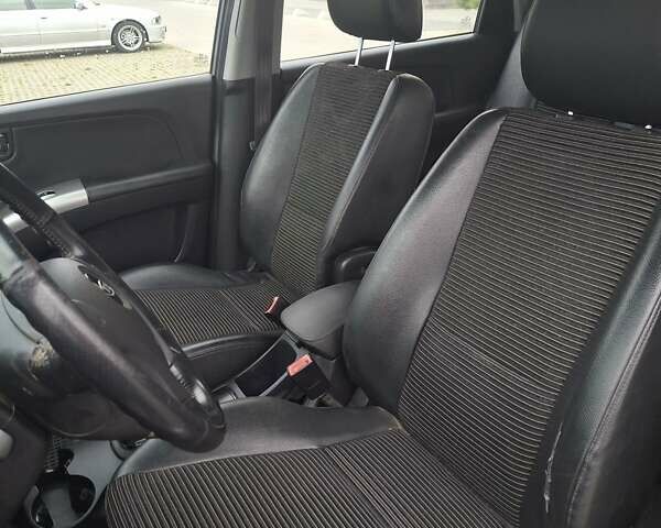 Серый Киа Sportage, объемом двигателя 2 л и пробегом 295 тыс. км за 8500 $, фото 15 на Automoto.ua