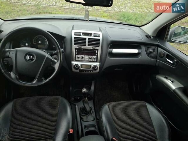Серый Киа Sportage, объемом двигателя 2 л и пробегом 295 тыс. км за 8500 $, фото 26 на Automoto.ua