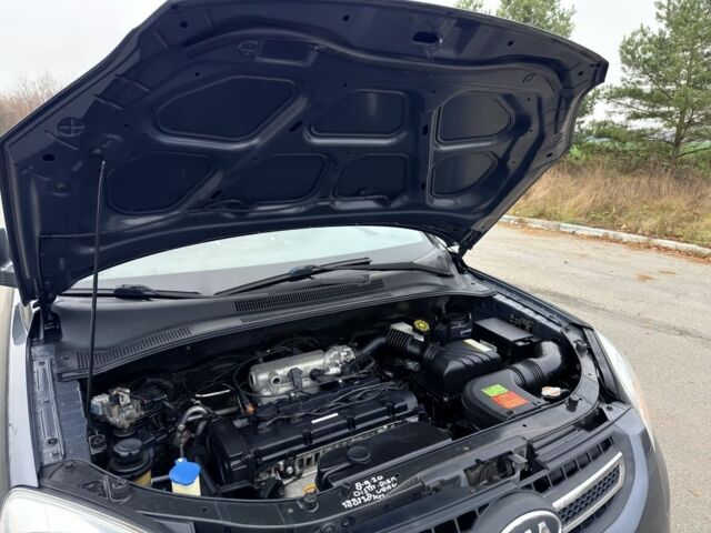 Серый Киа Sportage, объемом двигателя 2 л и пробегом 228 тыс. км за 8600 $, фото 23 на Automoto.ua