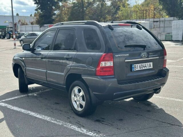 Серый Киа Sportage, объемом двигателя 2 л и пробегом 250 тыс. км за 7500 $, фото 4 на Automoto.ua