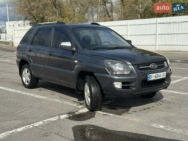 Серый Киа Sportage, объемом двигателя 2 л и пробегом 250 тыс. км за 7500 $, фото 2 на Automoto.ua