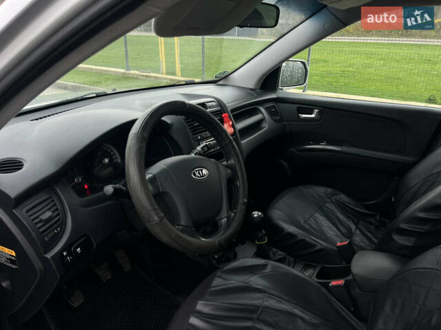 Серый Киа Sportage, объемом двигателя 1.99 л и пробегом 230 тыс. км за 8000 $, фото 16 на Automoto.ua