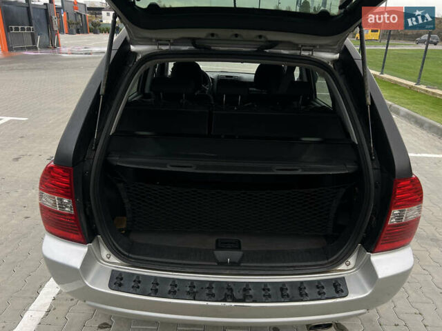 Серый Киа Sportage, объемом двигателя 1.99 л и пробегом 230 тыс. км за 8000 $, фото 21 на Automoto.ua