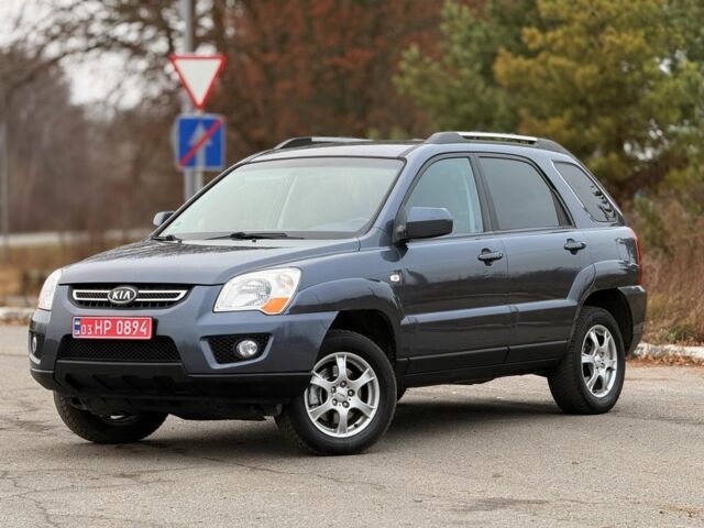 Серый Киа Sportage, объемом двигателя 2 л и пробегом 228 тыс. км за 8600 $, фото 4 на Automoto.ua