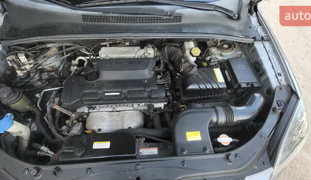 Сірий Кіа Sportage, об'ємом двигуна 2 л та пробігом 199 тис. км за 8690 $, фото 26 на Automoto.ua