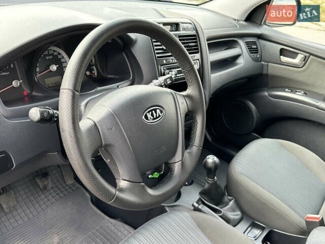Серый Киа Sportage, объемом двигателя 2 л и пробегом 167 тыс. км за 7600 $, фото 16 на Automoto.ua