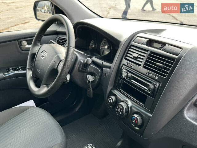 Серый Киа Sportage, объемом двигателя 2 л и пробегом 167 тыс. км за 7600 $, фото 21 на Automoto.ua