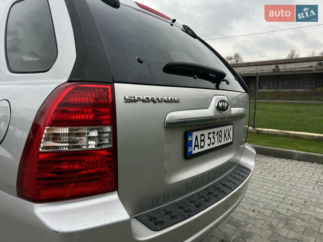 Серый Киа Sportage, объемом двигателя 1.99 л и пробегом 230 тыс. км за 8000 $, фото 25 на Automoto.ua