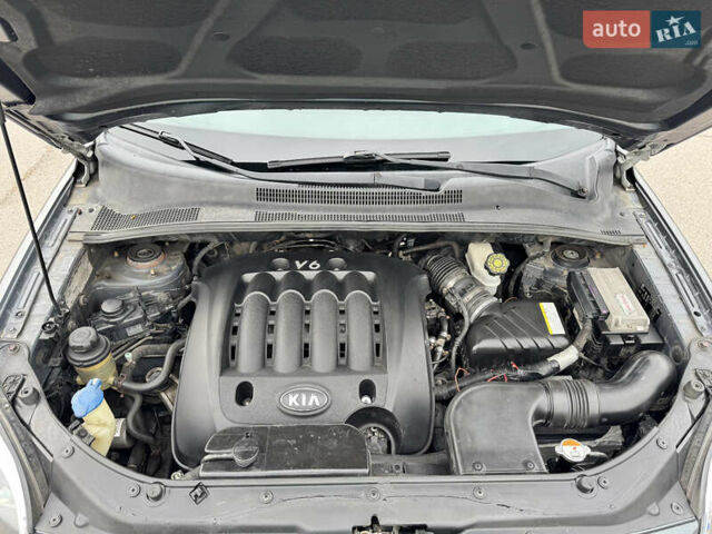 Серый Киа Sportage, объемом двигателя 2.7 л и пробегом 281 тыс. км за 7800 $, фото 28 на Automoto.ua