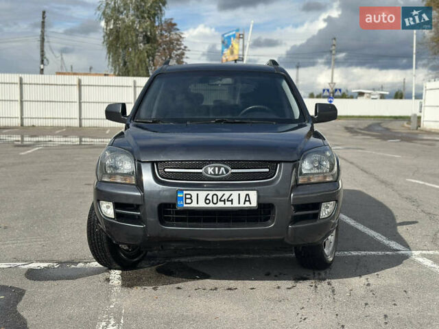 Серый Киа Sportage, объемом двигателя 2 л и пробегом 250 тыс. км за 7500 $, фото 1 на Automoto.ua