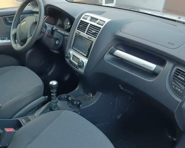 Сірий Кіа Sportage, об'ємом двигуна 1.99 л та пробігом 258 тис. км за 8500 $, фото 6 на Automoto.ua