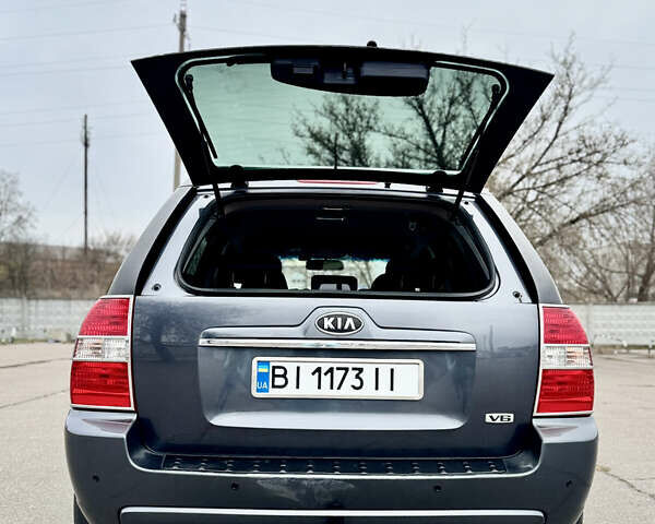 Серый Киа Sportage, объемом двигателя 2.7 л и пробегом 281 тыс. км за 7800 $, фото 7 на Automoto.ua