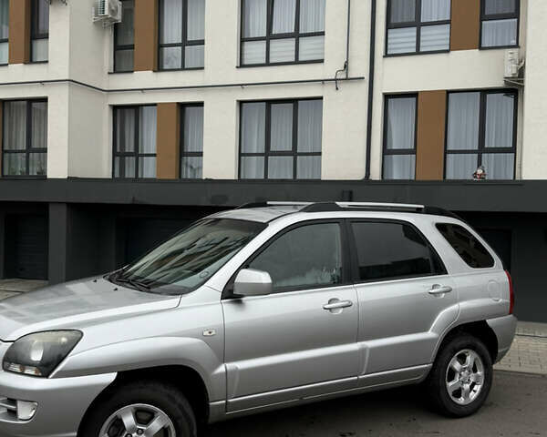 Серый Киа Sportage, объемом двигателя 2 л и пробегом 268 тыс. км за 7000 $, фото 2 на Automoto.ua