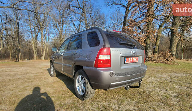Сірий Кіа Sportage, об'ємом двигуна 2 л та пробігом 199 тис. км за 8690 $, фото 21 на Automoto.ua