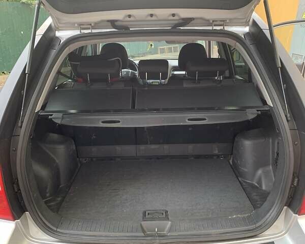 Серый Киа Sportage, объемом двигателя 2 л и пробегом 219 тыс. км за 7800 $, фото 11 на Automoto.ua