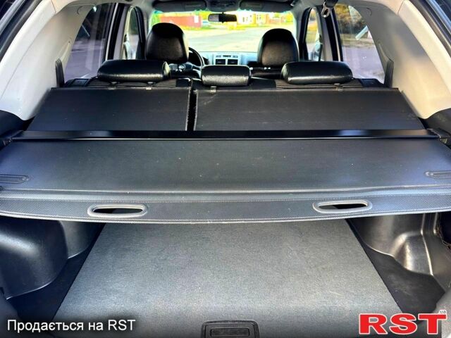 Сірий Кіа Sportage, об'ємом двигуна 2 л та пробігом 178 тис. км за 7450 $, фото 9 на Automoto.ua