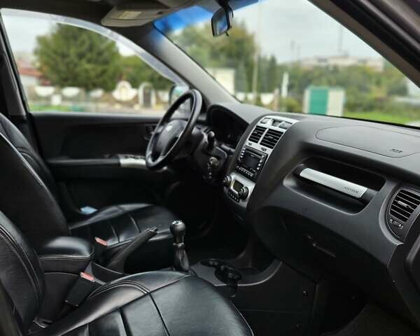 Серый Киа Sportage, объемом двигателя 1.98 л и пробегом 113 тыс. км за 8500 $, фото 10 на Automoto.ua