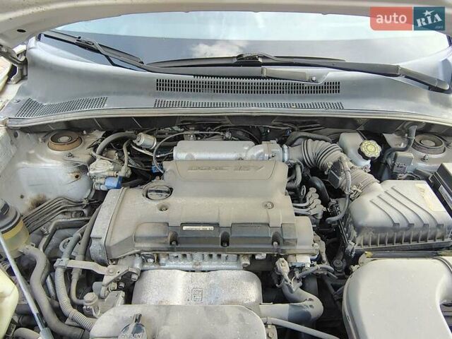 Серый Киа Sportage, объемом двигателя 2 л и пробегом 156 тыс. км за 8400 $, фото 18 на Automoto.ua