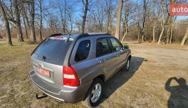 Сірий Кіа Sportage, об'ємом двигуна 2 л та пробігом 199 тис. км за 8690 $, фото 23 на Automoto.ua