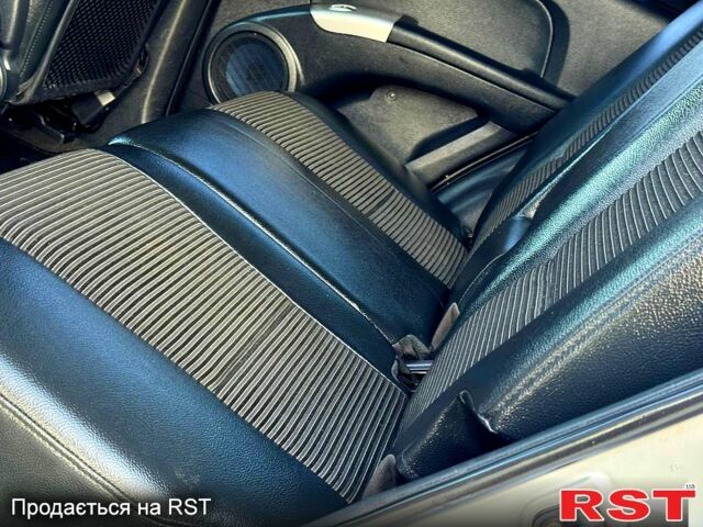 Сірий Кіа Sportage, об'ємом двигуна 2 л та пробігом 178 тис. км за 7450 $, фото 6 на Automoto.ua