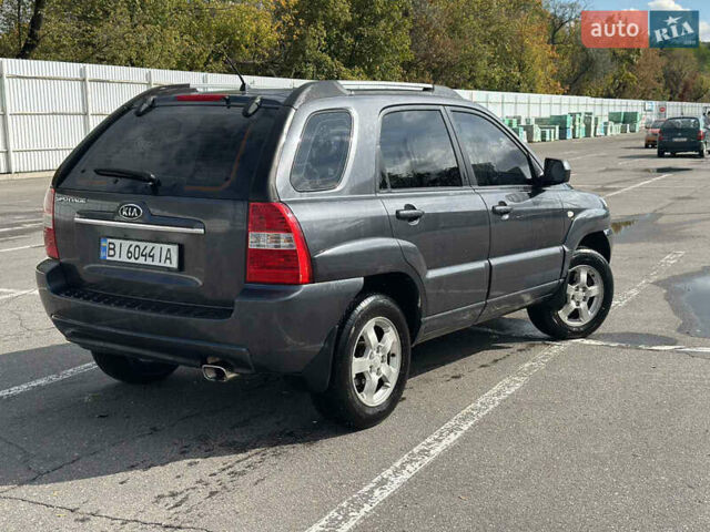 Серый Киа Sportage, объемом двигателя 2 л и пробегом 250 тыс. км за 7500 $, фото 3 на Automoto.ua