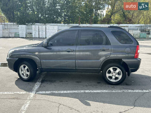 Серый Киа Sportage, объемом двигателя 2 л и пробегом 250 тыс. км за 7500 $, фото 6 на Automoto.ua