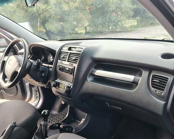 Серый Киа Sportage, объемом двигателя 2 л и пробегом 156 тыс. км за 8400 $, фото 13 на Automoto.ua