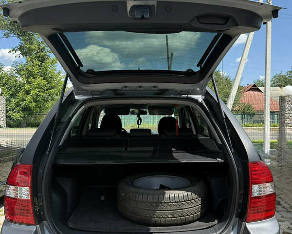 Серый Киа Sportage, объемом двигателя 1.98 л и пробегом 269 тыс. км за 8000 $, фото 14 на Automoto.ua