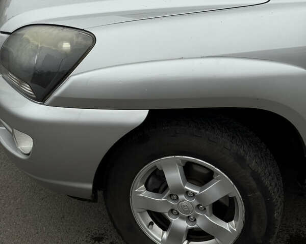 Серый Киа Sportage, объемом двигателя 2 л и пробегом 268 тыс. км за 7000 $, фото 3 на Automoto.ua