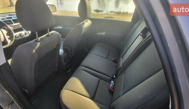Сірий Кіа Sportage, об'ємом двигуна 2 л та пробігом 199 тис. км за 8690 $, фото 14 на Automoto.ua