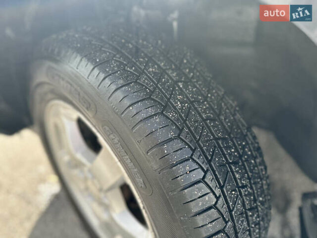 Серый Киа Sportage, объемом двигателя 2 л и пробегом 250 тыс. км за 7500 $, фото 10 на Automoto.ua