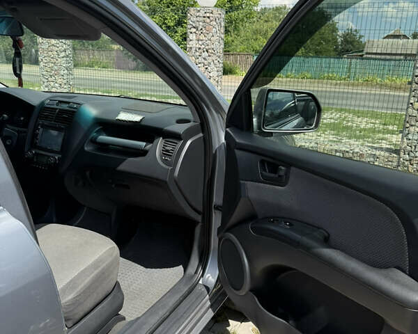 Серый Киа Sportage, объемом двигателя 1.98 л и пробегом 269 тыс. км за 8000 $, фото 15 на Automoto.ua