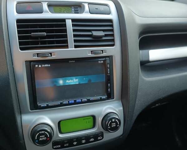 Сірий Кіа Sportage, об'ємом двигуна 1.99 л та пробігом 258 тис. км за 8500 $, фото 3 на Automoto.ua