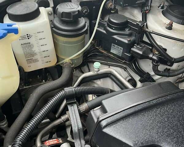 Серый Киа Sportage, объемом двигателя 1.98 л и пробегом 183 тыс. км за 8000 $, фото 5 на Automoto.ua