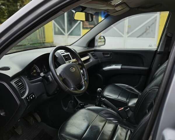 Серый Киа Sportage, объемом двигателя 1.98 л и пробегом 113 тыс. км за 8500 $, фото 2 на Automoto.ua