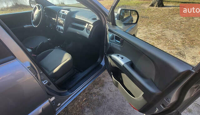 Сірий Кіа Sportage, об'ємом двигуна 2 л та пробігом 199 тис. км за 8690 $, фото 20 на Automoto.ua