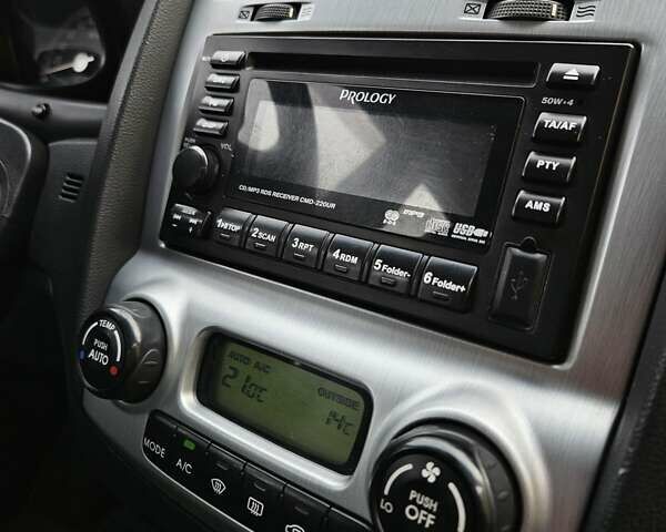 Серый Киа Sportage, объемом двигателя 1.98 л и пробегом 113 тыс. км за 8500 $, фото 14 на Automoto.ua