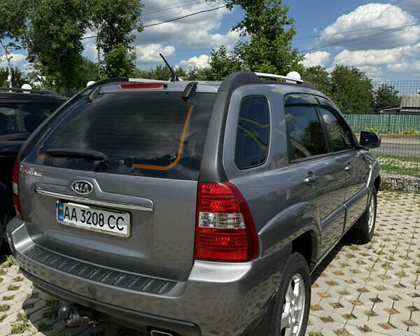 Серый Киа Sportage, объемом двигателя 1.98 л и пробегом 269 тыс. км за 8000 $, фото 2 на Automoto.ua