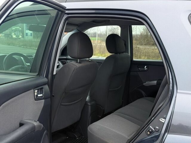 Серый Киа Sportage, объемом двигателя 2 л и пробегом 228 тыс. км за 8600 $, фото 13 на Automoto.ua