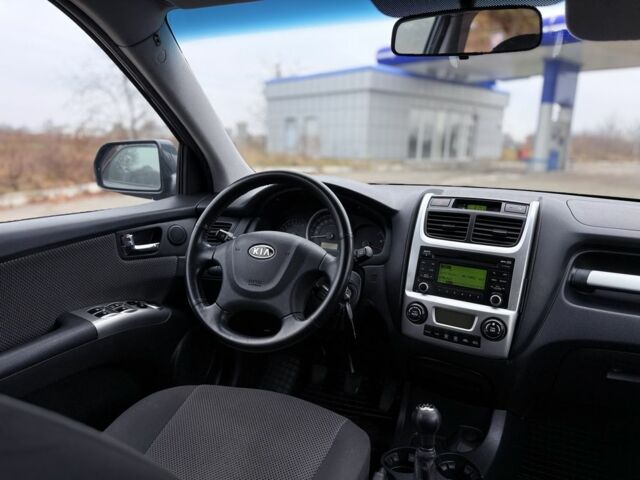 Серый Киа Sportage, объемом двигателя 2 л и пробегом 228 тыс. км за 8600 $, фото 15 на Automoto.ua