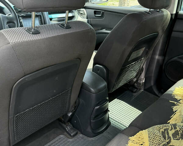 Серый Киа Sportage, объемом двигателя 1.98 л и пробегом 269 тыс. км за 8000 $, фото 13 на Automoto.ua