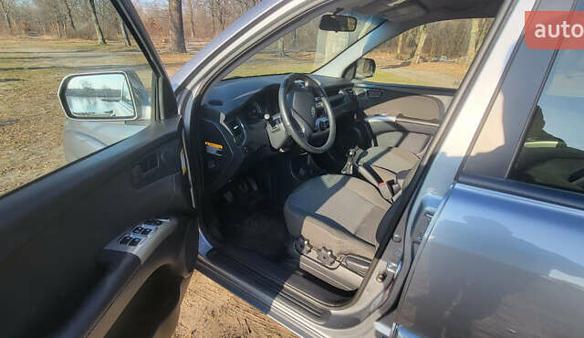 Сірий Кіа Sportage, об'ємом двигуна 2 л та пробігом 199 тис. км за 8690 $, фото 18 на Automoto.ua