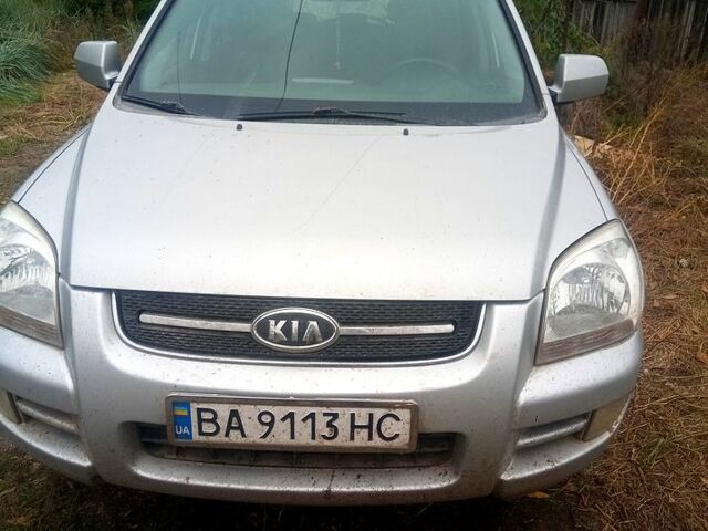 Серый Киа Sportage, объемом двигателя 2 л и пробегом 246 тыс. км за 8000 $, фото 3 на Automoto.ua