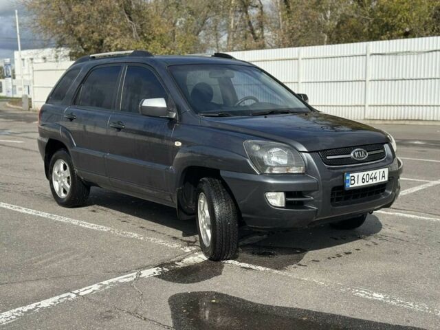 Серый Киа Sportage, объемом двигателя 2 л и пробегом 250 тыс. км за 7500 $, фото 2 на Automoto.ua