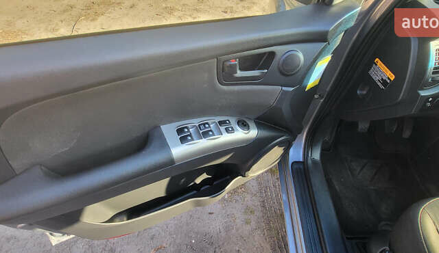 Сірий Кіа Sportage, об'ємом двигуна 2 л та пробігом 199 тис. км за 8690 $, фото 15 на Automoto.ua