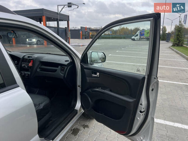 Серый Киа Sportage, объемом двигателя 1.99 л и пробегом 230 тыс. км за 8000 $, фото 20 на Automoto.ua